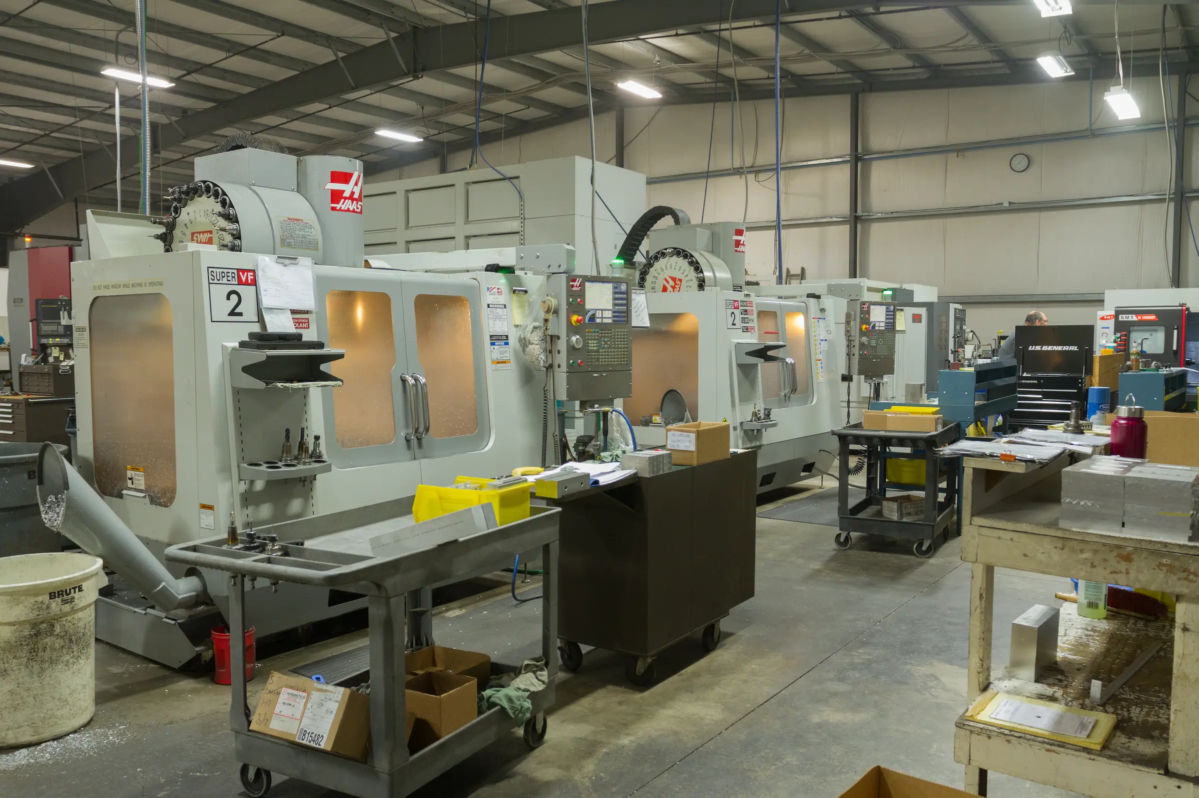 Industrial CNC machines in a factory setting